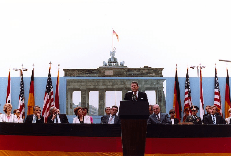 Ronald Reagan speaking in front of the Brandenburg Gate and the Berlin Wall on June 12, 1987