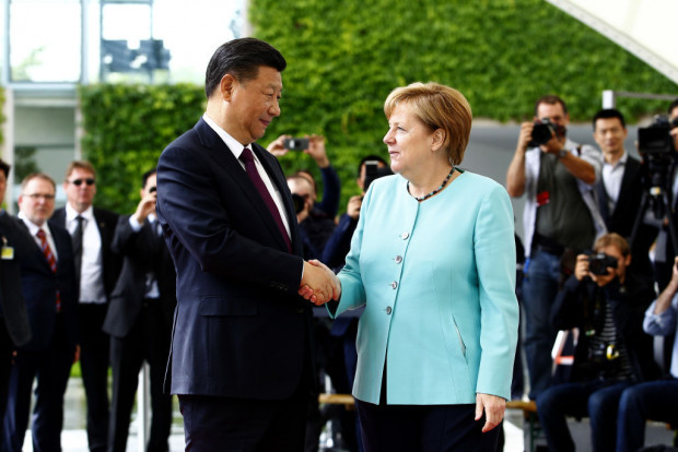 Xi Jinping und Angela Merkel stets dabei, „die Anleitung zur öffentlichen Meinung zu stärken“.