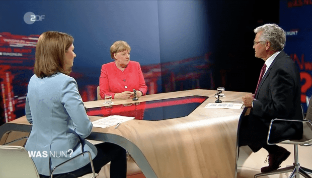 Merkels „demokratische Zumutung“ und ein ganz festes Versprechen